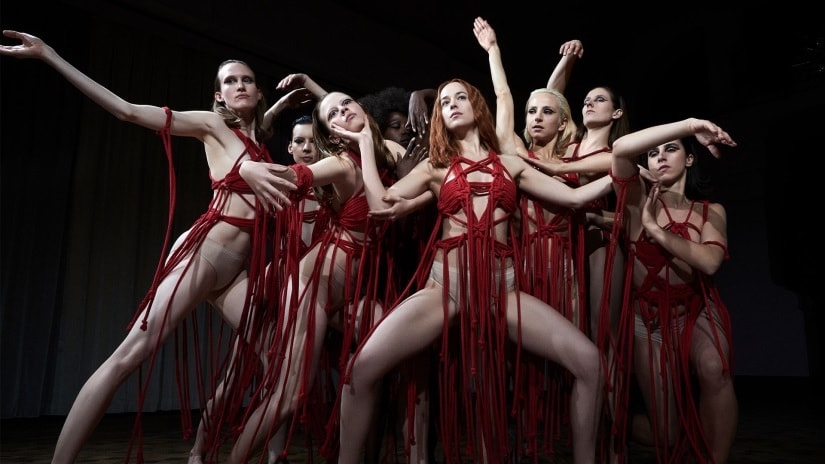 Luca Guadagnino's Suspiria is a contemporary interpretation — rather than a traditional retelling — of Dario Argento's cult horror classic.